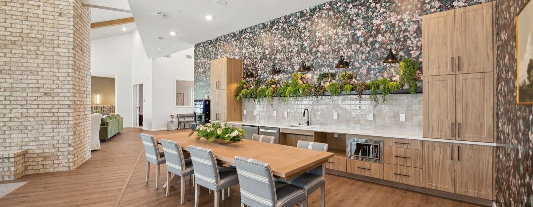 a large room with a table and chairs