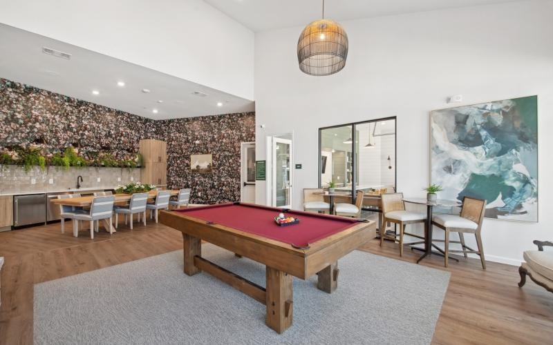 a room with a table and chairs